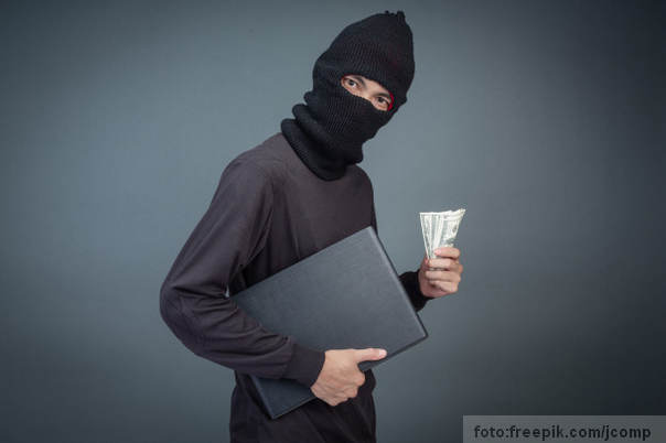 Ilustracija: lopov krađa laptopa