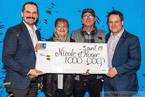 loto dobitnici(u sredini) Nicole Pedneault i Roger Larocque FOTO: Lotto Quebec