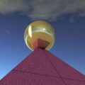 kugla zlatna vrh piramide